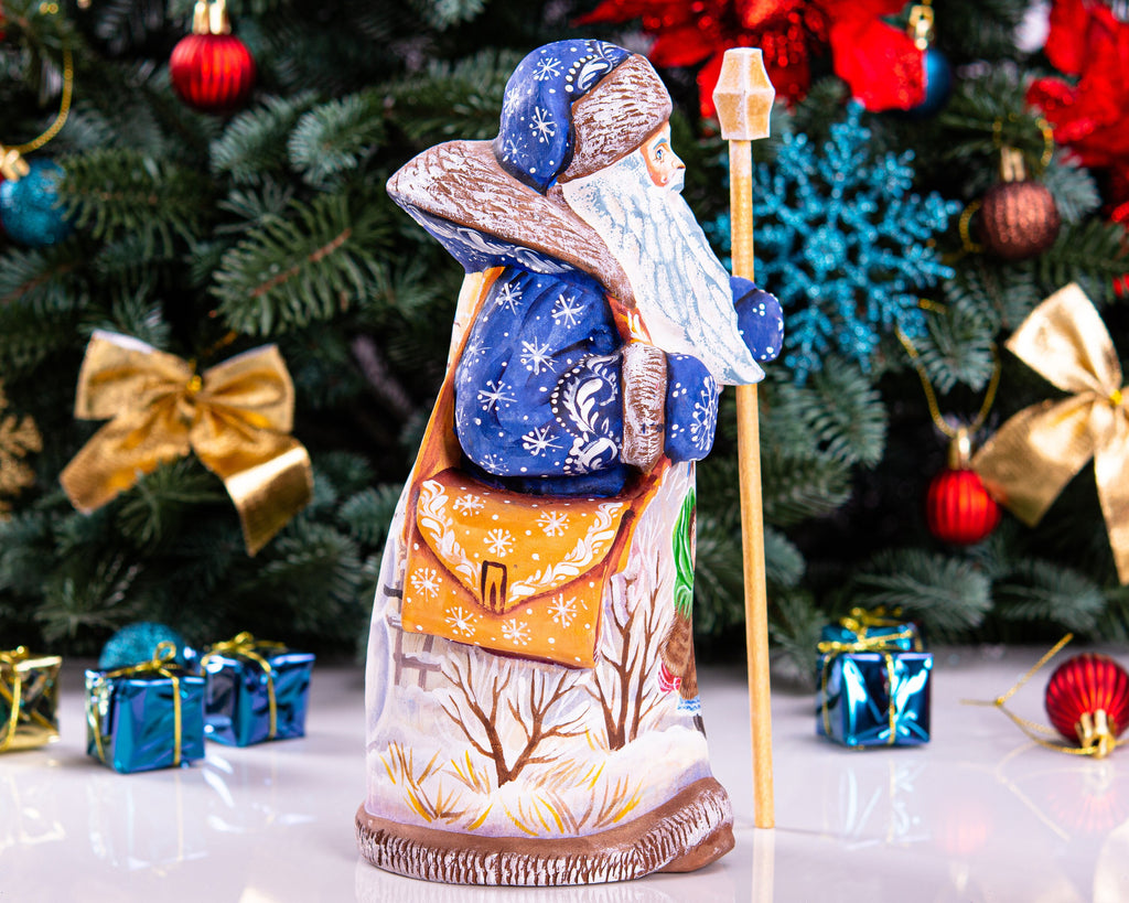 Old-World Santa wood figurine 9 inch, child with winter birds scene, shelf display