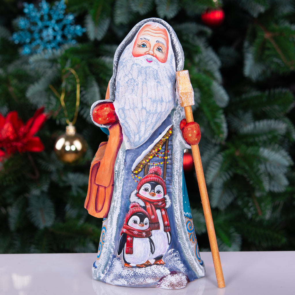 Kris Kringle solid wood figurine 9 inch, teal robe penguins, shelf decor