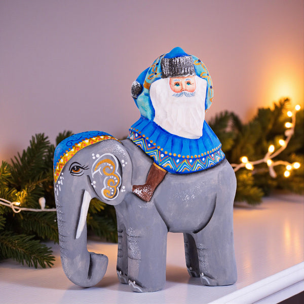 Hand‑carved Father Christmas — riding an elephant, 6.3″