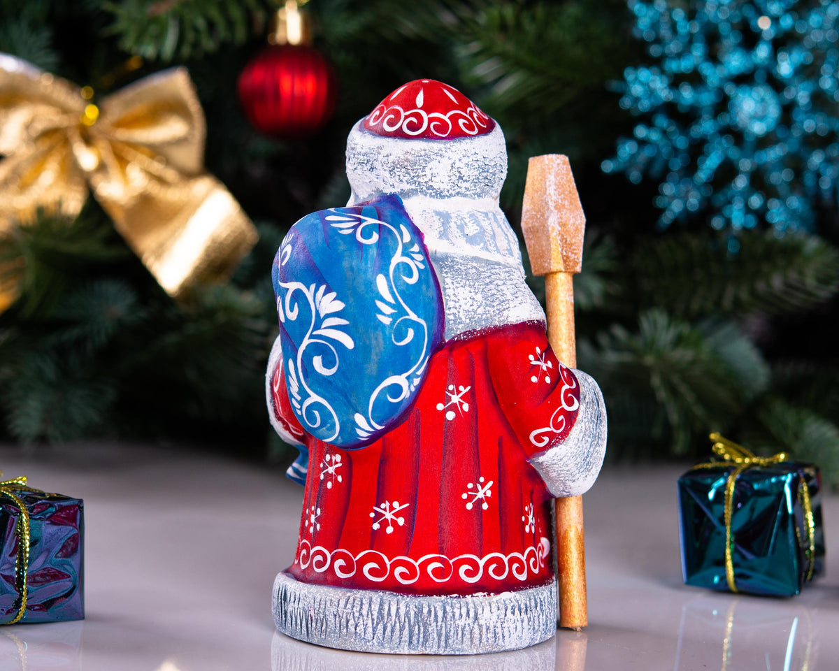 Handcrafted Wooden Santa Figurine: Folk Art Christmas Decor