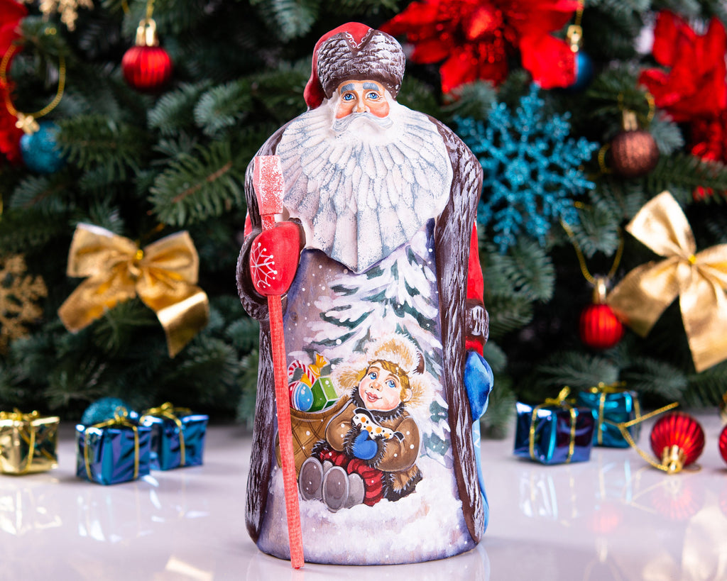 Hand carved wooden Santa figurine 9.5 inch, boy with sled, Christmas mantel decor
