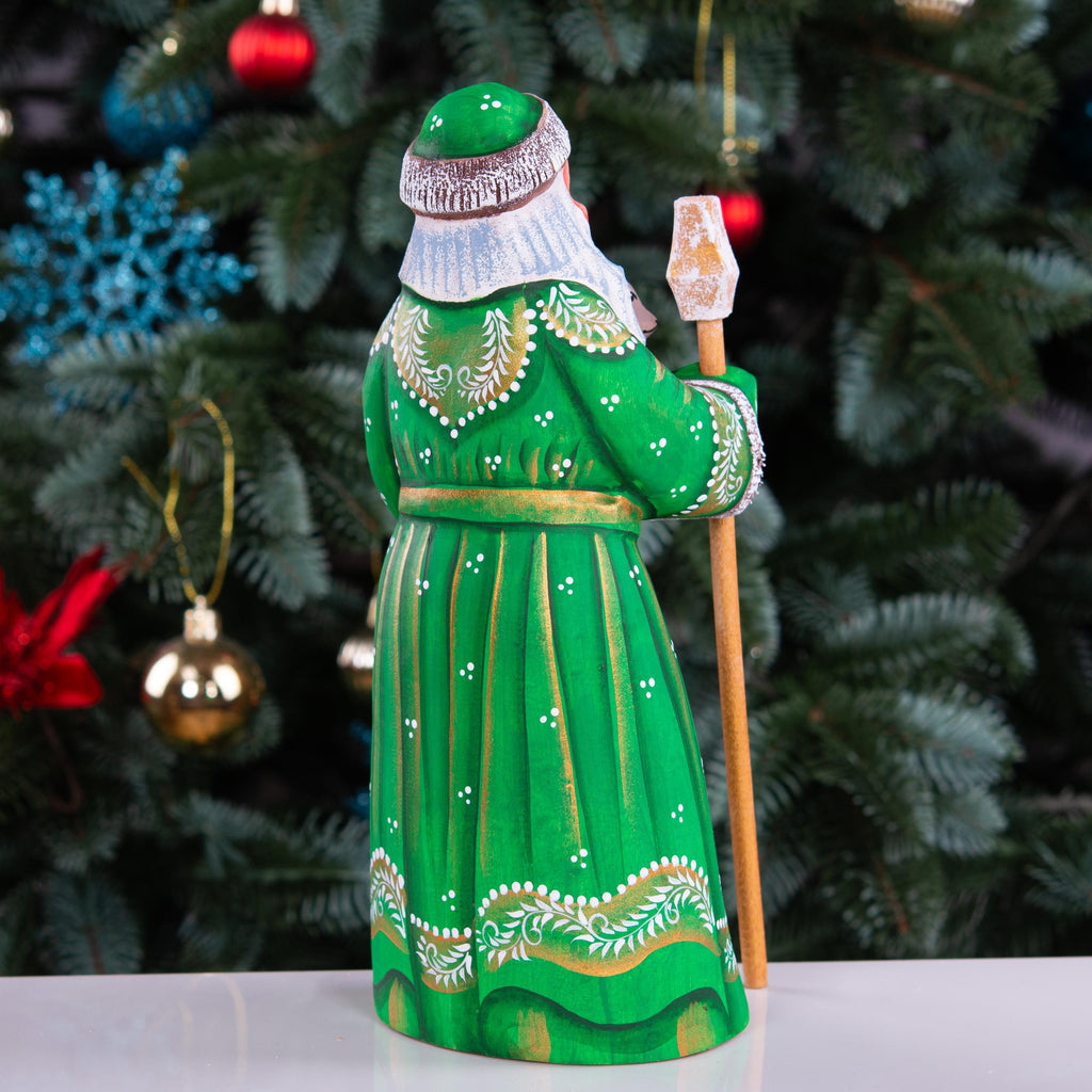 Hand carved Santa wooden figurine 8.7 inch, holding dog, green coat