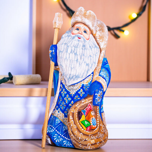 Hand carved blue Santa wooden figurine 9 inch, toy sack, mantel decor
