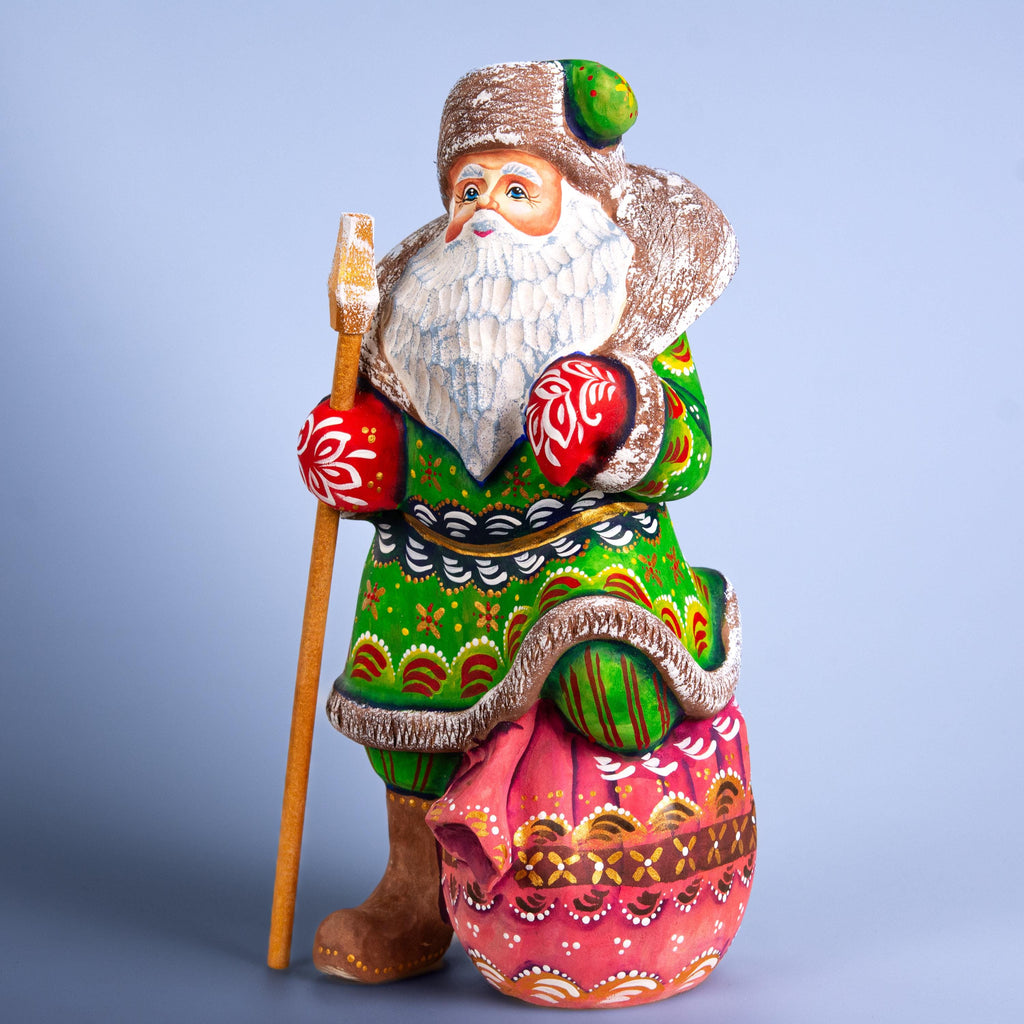 Santa Claus wood carving with staff, gift sack pedestal, 9.4 inch