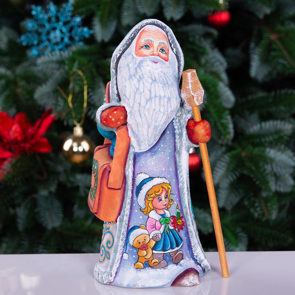 Hand carved Santa statue 9 inch, blue coat, child and teddy