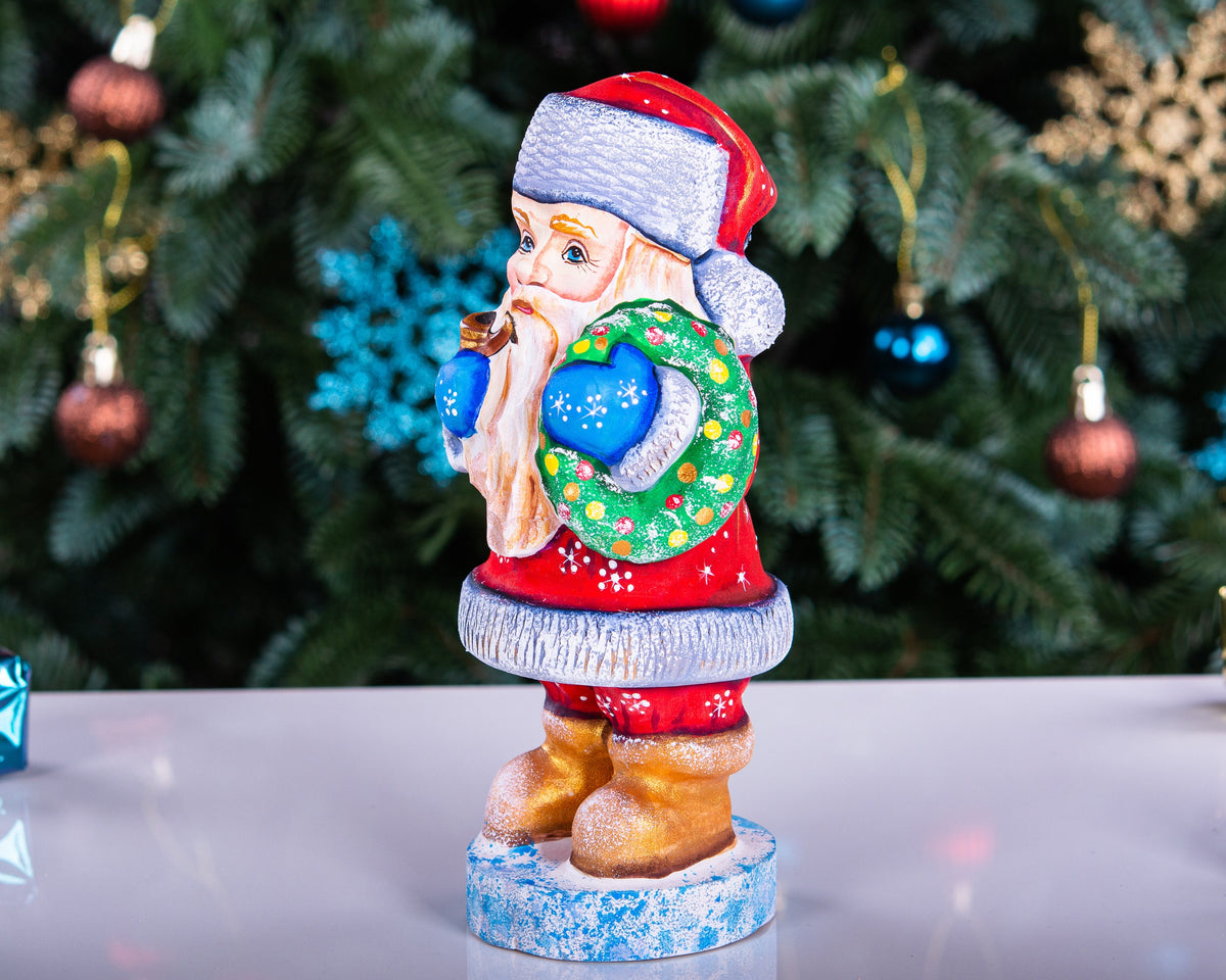Santa Figurine 7", Hand‑Carved Wood, Christmas Wreath & Pipe