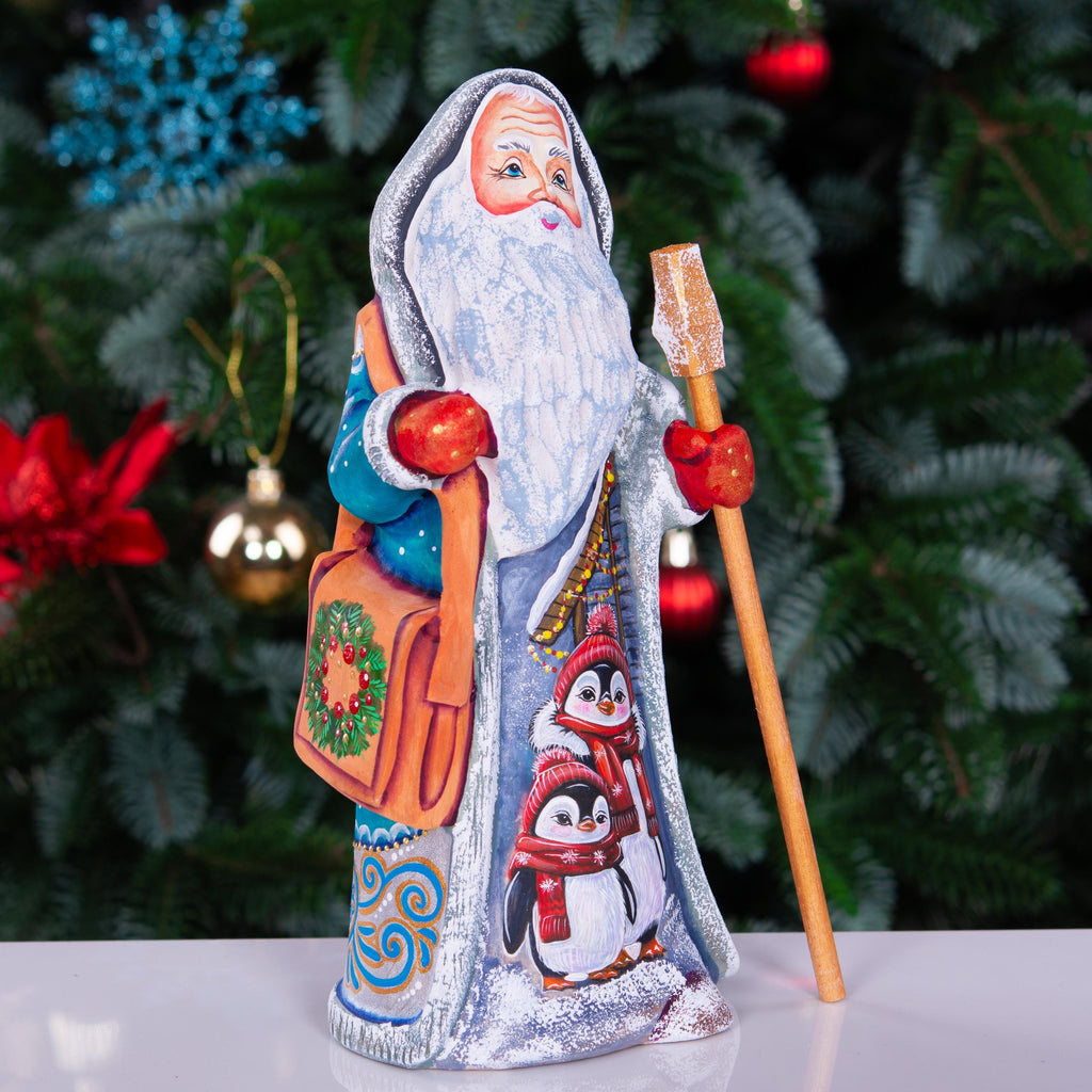 Kris Kringle solid wood figurine 9 inch, teal robe penguins, shelf decor