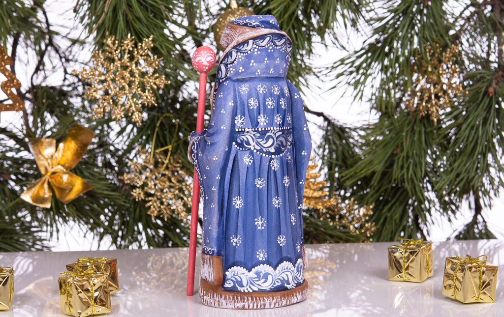 Hand carved and painted Santa 9 inch wooden figurine, snowy sledding scene, centerpiece