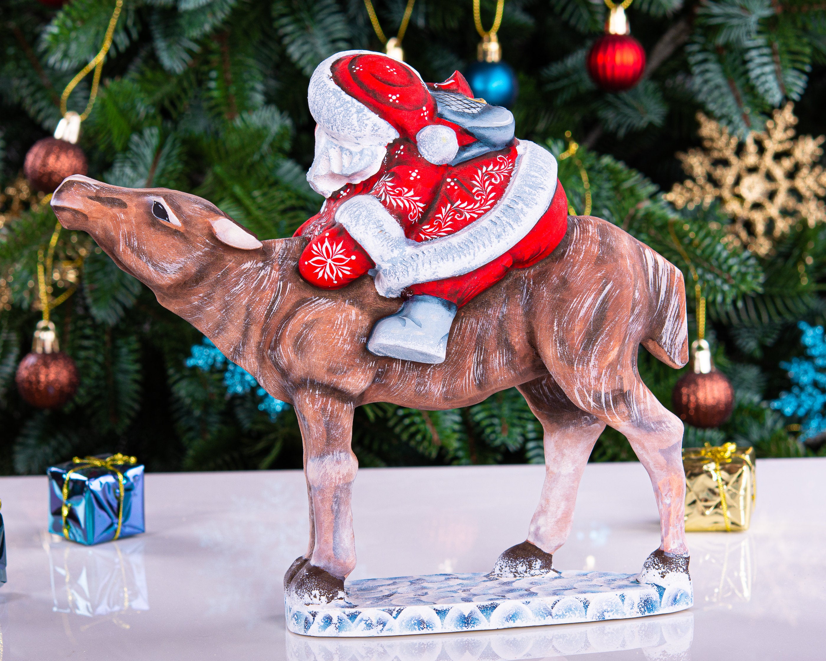 Hand carved wooden Santa riding reindeer figurine 8 inch, Nordic folk art centerpiece