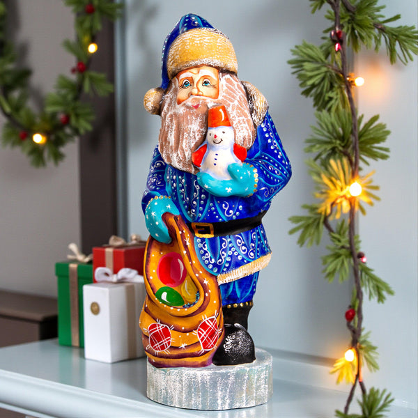 Hand carved blue Santa wooden figurine 10 inch, snowman in hand