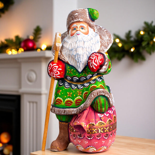 Santa Claus wood carving with staff, gift sack pedestal, 9.4 inch