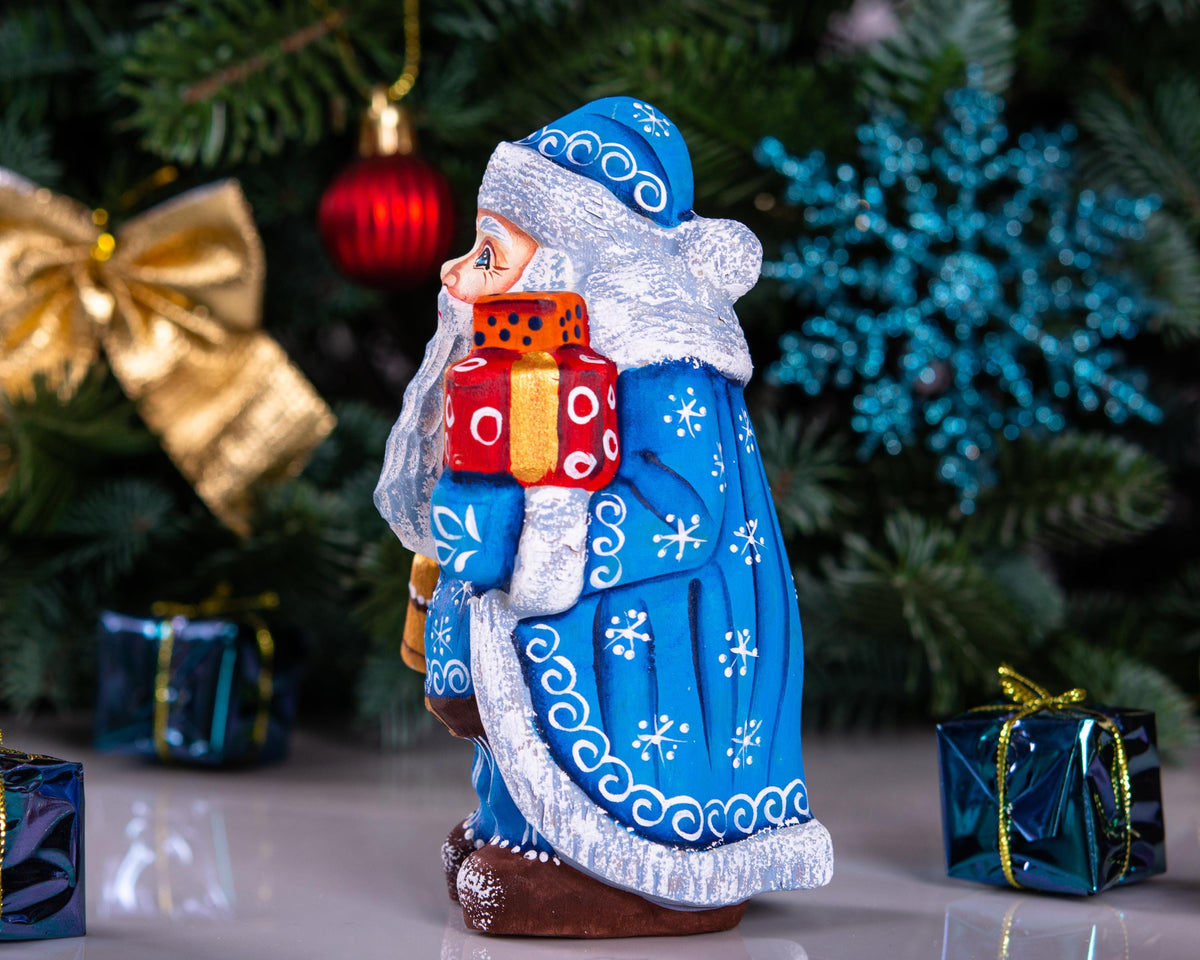 Blue Father Christmas figurine 5.5" with gold bell and stacked gifts