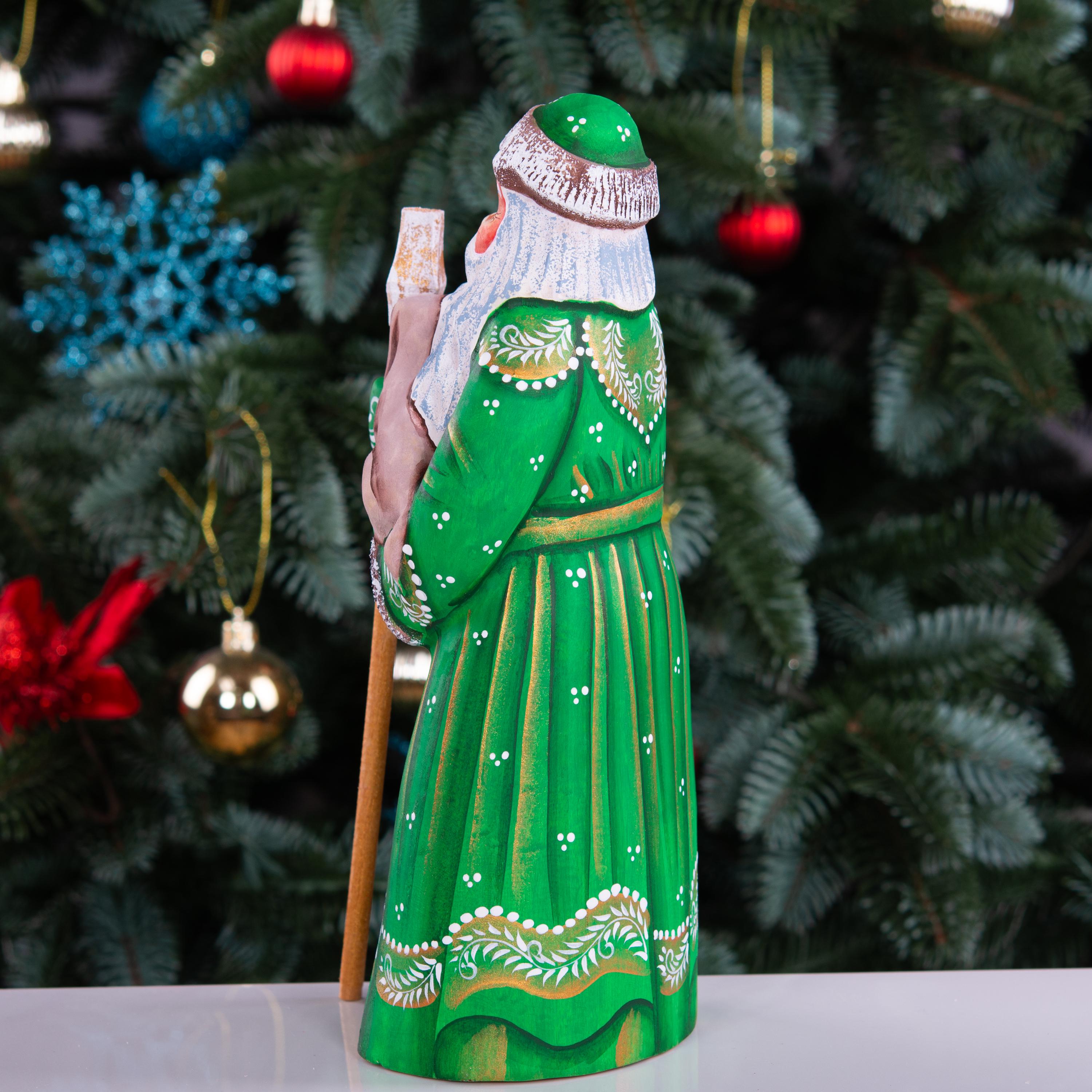 Hand carved Santa wooden figurine 8.7 inch, holding dog, green coat