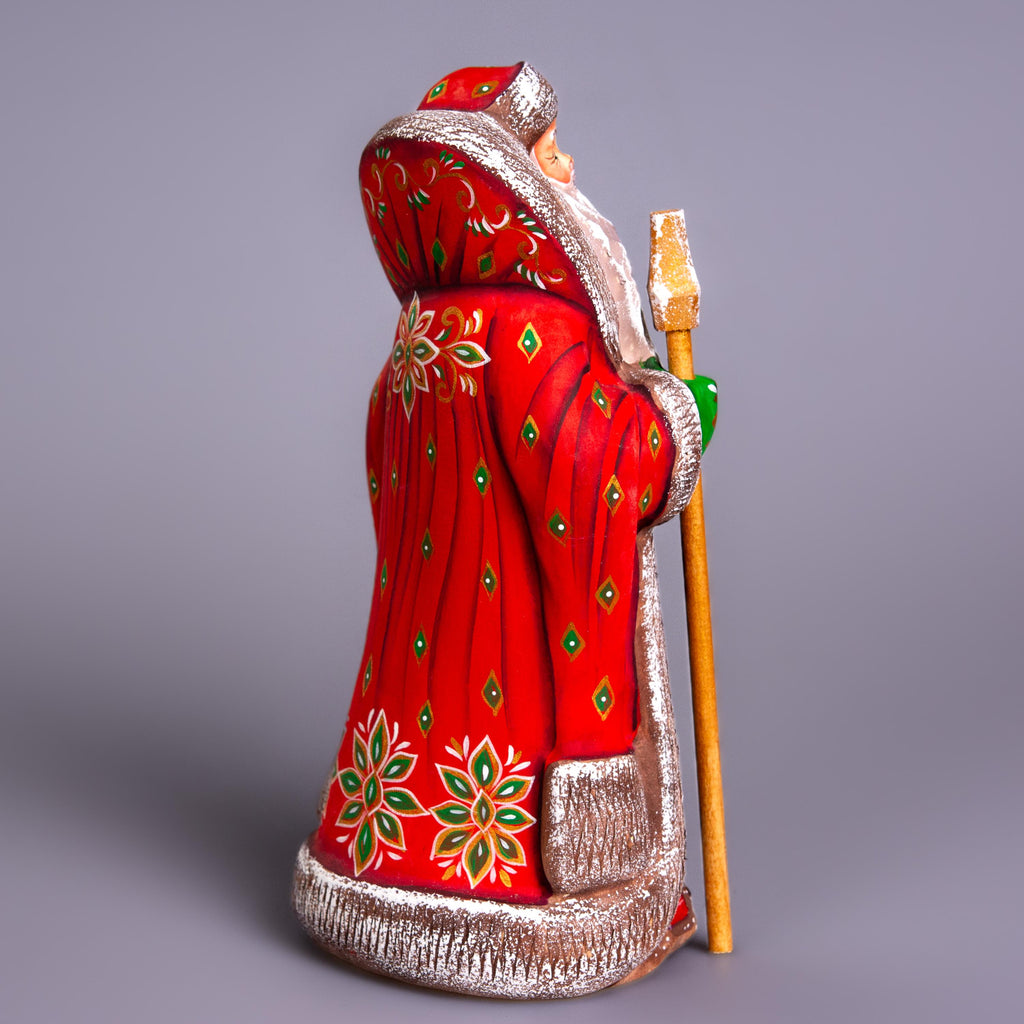 Santa Claus figurine 9.4 inch, folk art Santa reading by fireplace