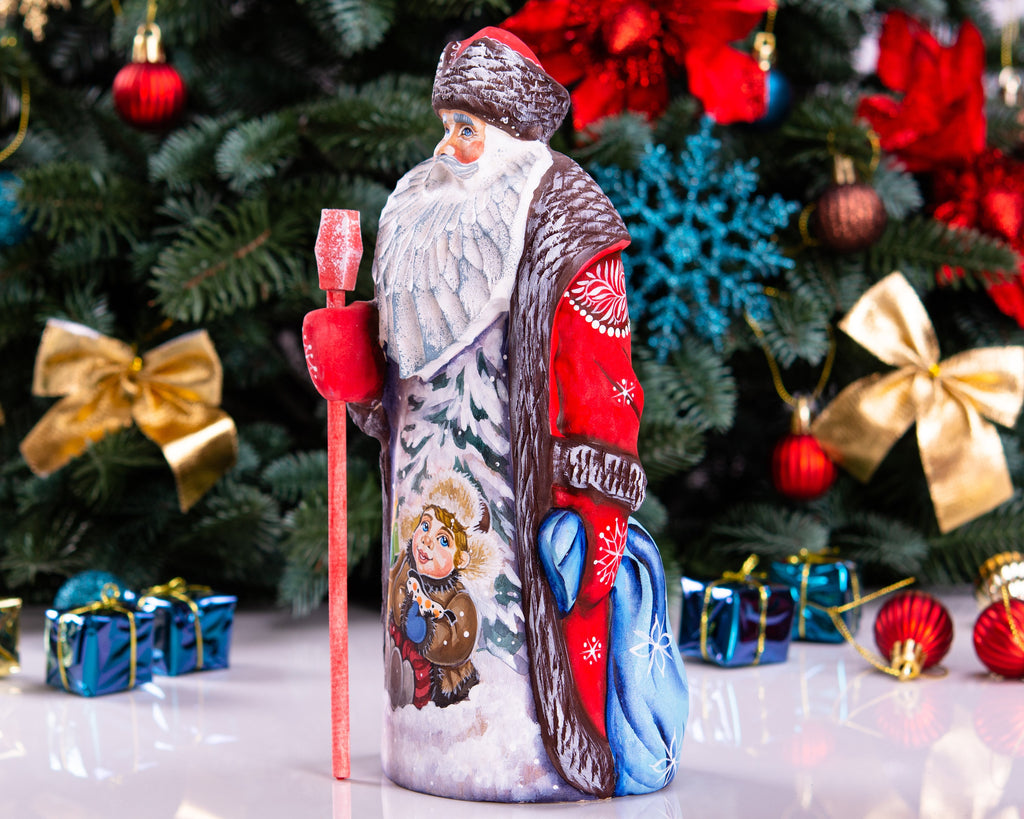 Hand carved wooden Santa figurine 9.5 inch, boy with sled, Christmas mantel decor