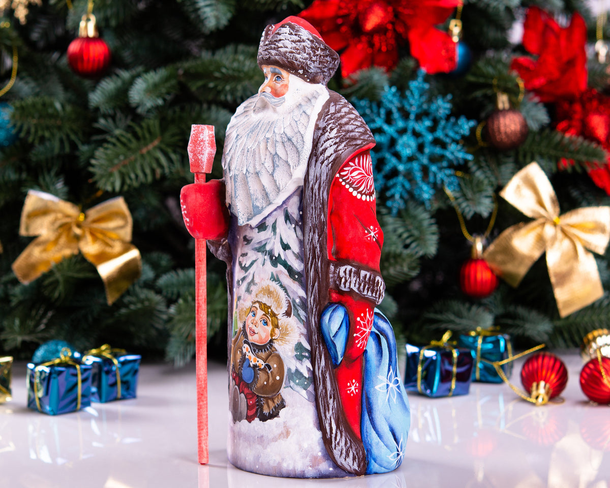 Hand carved wooden Santa figurine 9.5 inch, boy with sled, Christmas mantel decor