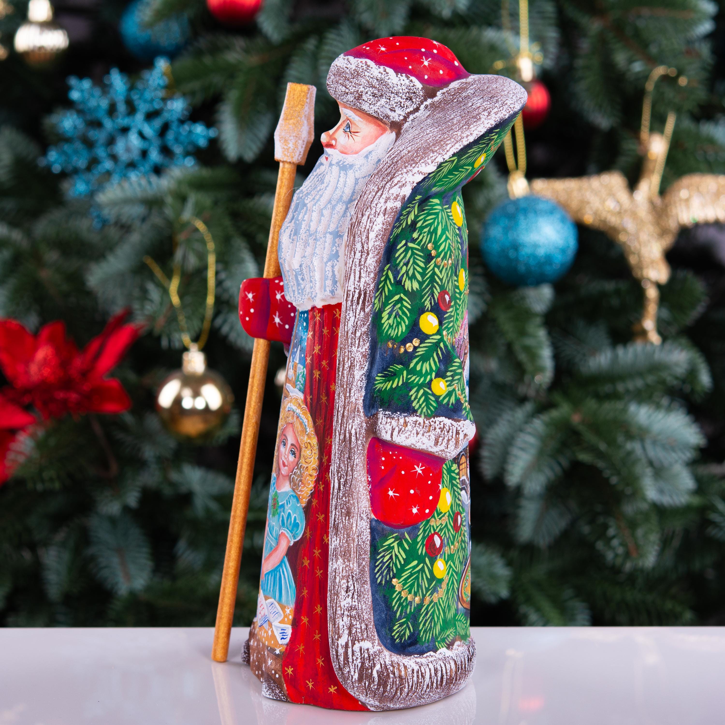 Collectible Santa figurine with staff, girl writing wish list scene, 9.5 inch