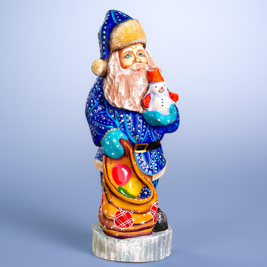 Hand carved blue Santa wooden figurine 10 inch, snowman in hand
