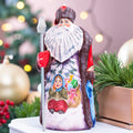 Kris Kringle wooden Santa figurine 9.4 inch, folk art winter child scene, shelf decor