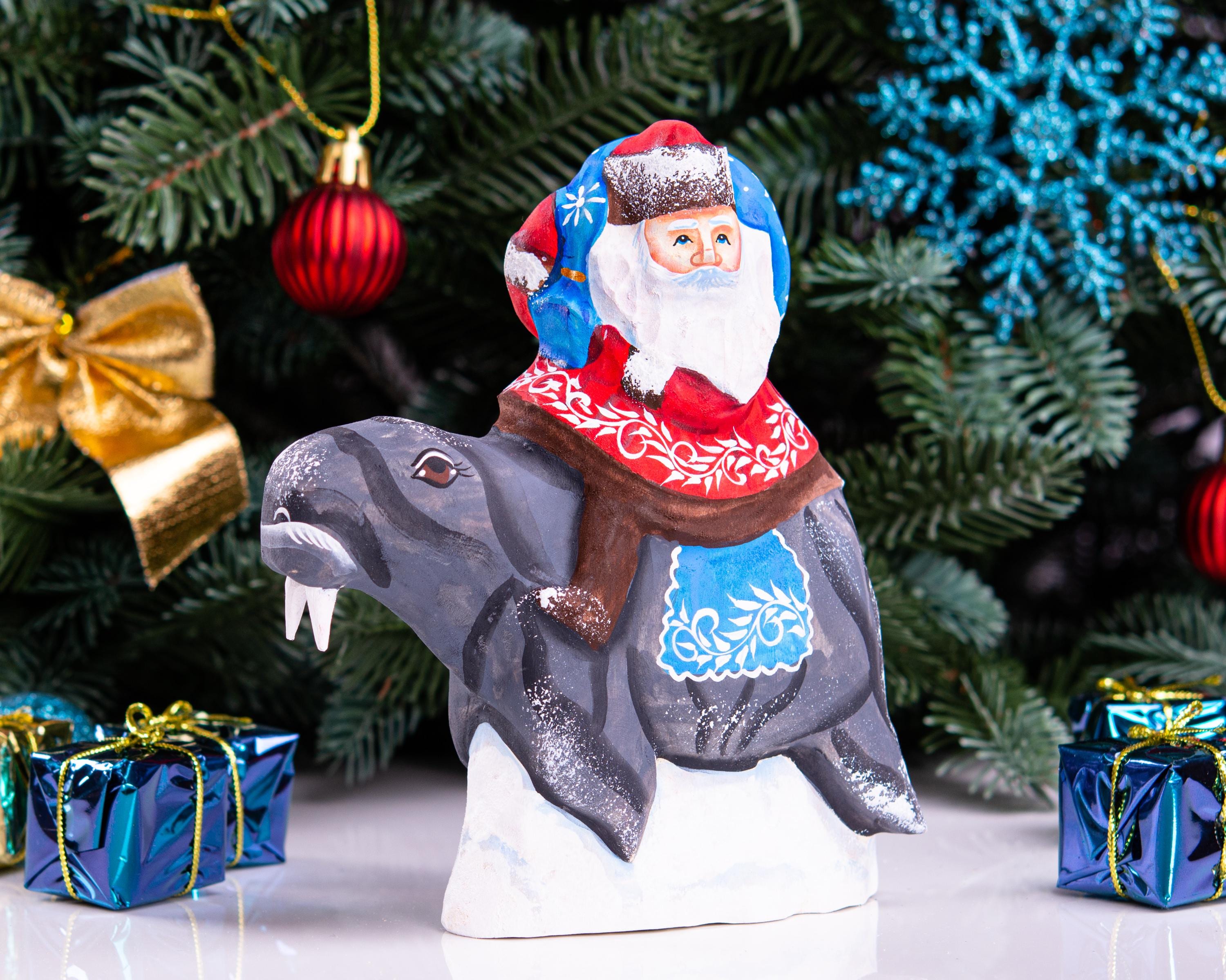 Hand Carved Wooden Santa Claus on Walrus - Christmas Figurine
