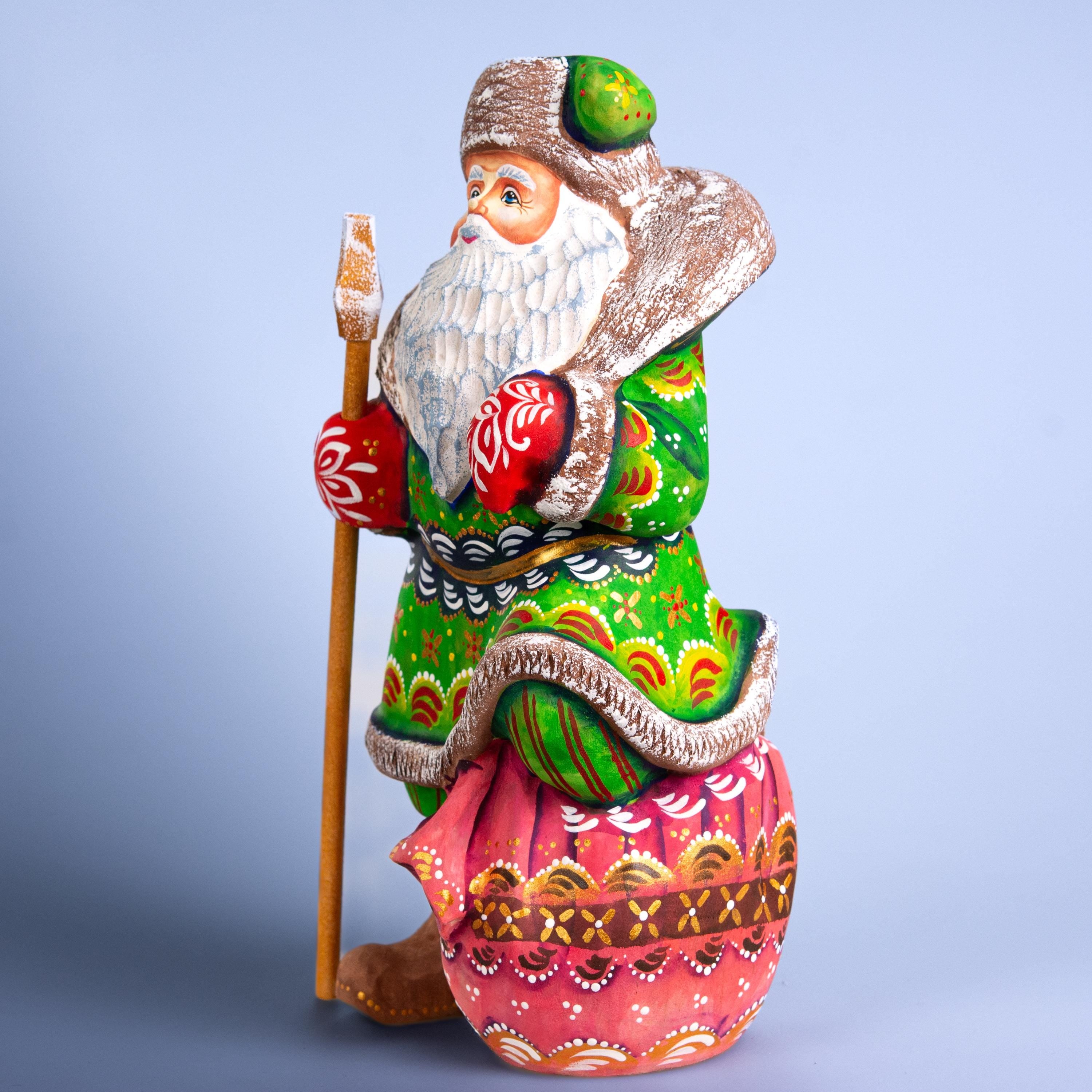 Santa Claus wood carving with staff, gift sack pedestal, 9.4 inch