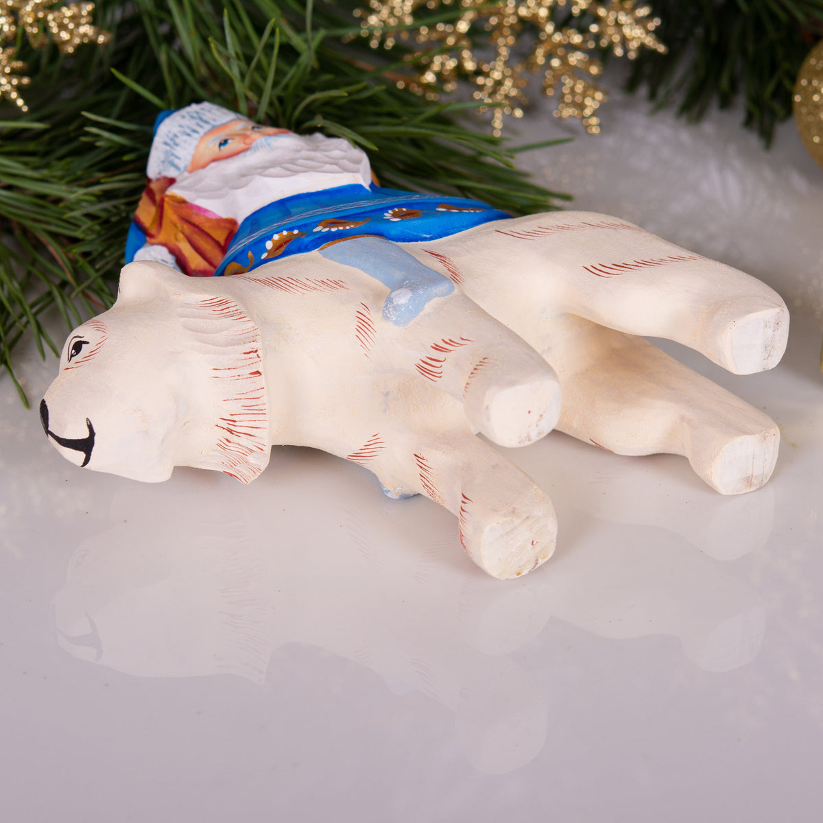 Old World Santa figurine riding polar bear, hand painted 6 inch