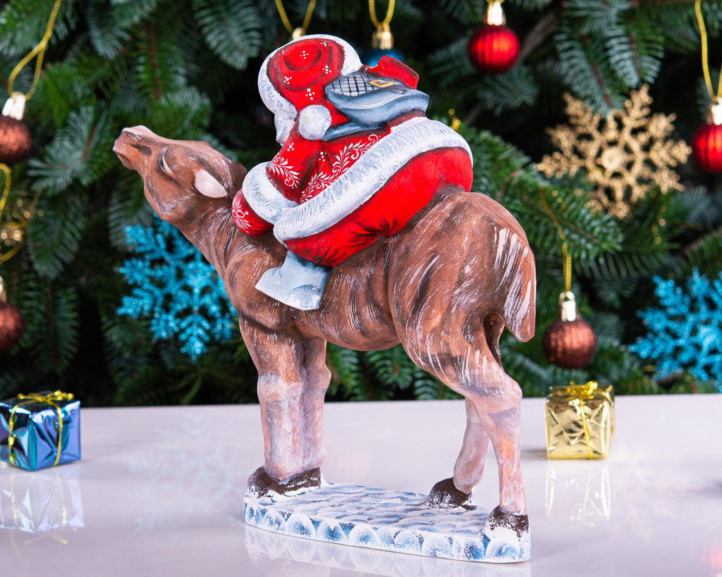 Hand carved wooden Santa riding reindeer figurine 8 inch, Nordic folk art centerpiece