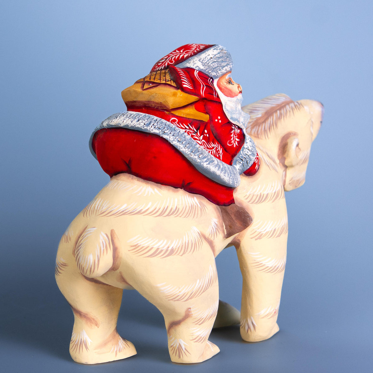 Hand-Carved Wooden Santa Riding Bear Figurine: Christmas Holiday Decor