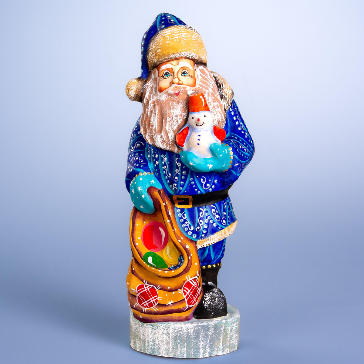 Hand carved blue Santa wooden figurine 10 inch, snowman in hand