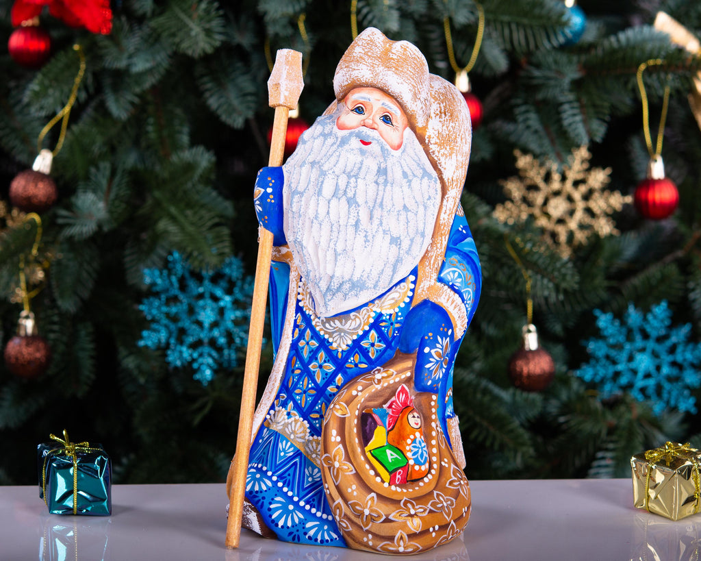 Hand carved blue Santa wooden figurine 9 inch, toy sack, mantel decor