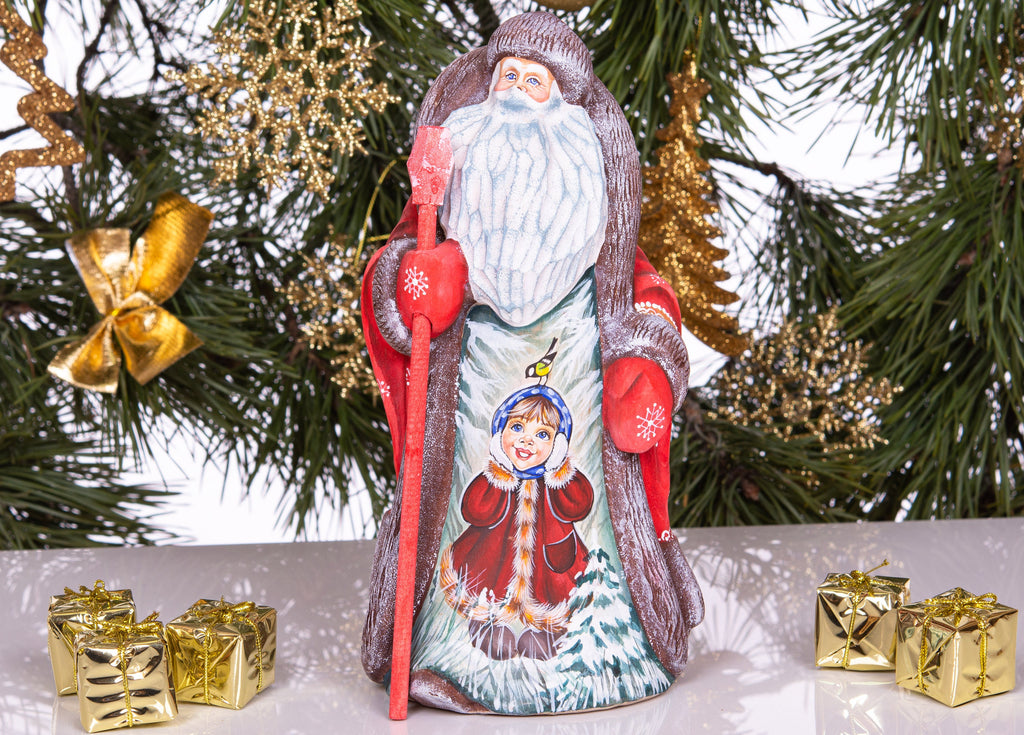 Old-World Santa wooden figurine 9.4 inch, winter child scene with bird, mantel display