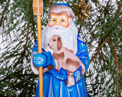 Blue Santa wood figurine 8.7 inch, hand carved with dog, Christmas shelf accent