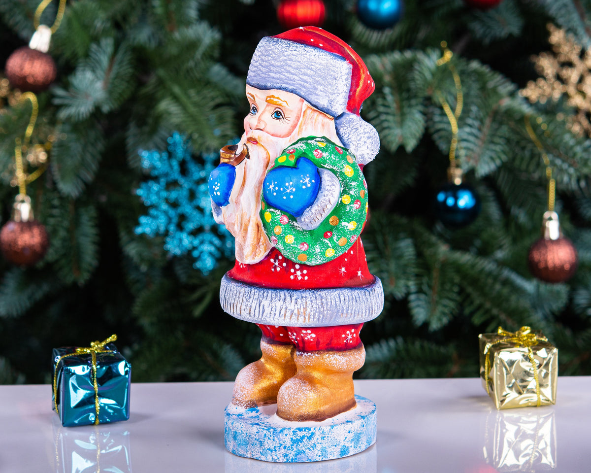 Santa Figurine 7", Hand‑Carved Wood, Christmas Wreath & Pipe