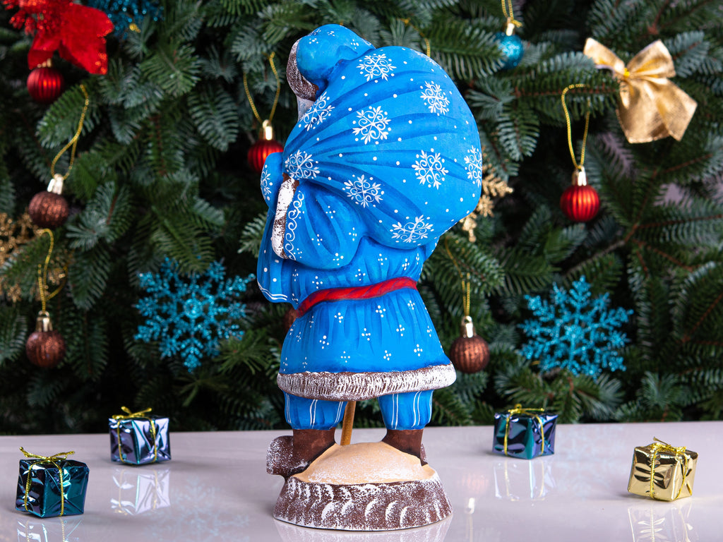 Hand carved blue Santa figurine 11 inch, gift sack, mantel decor