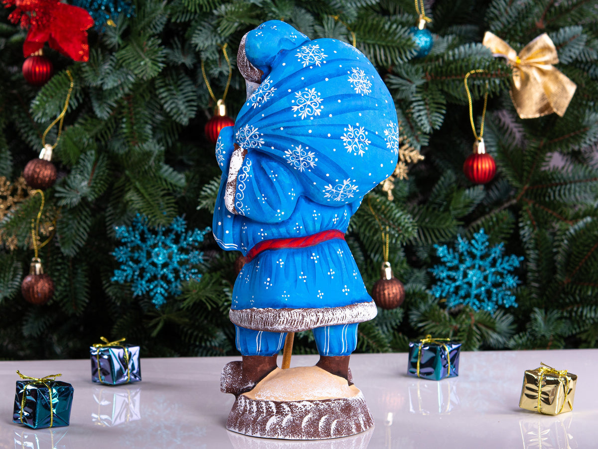 Hand carved blue Santa figurine 11 inch, gift sack, mantel decor