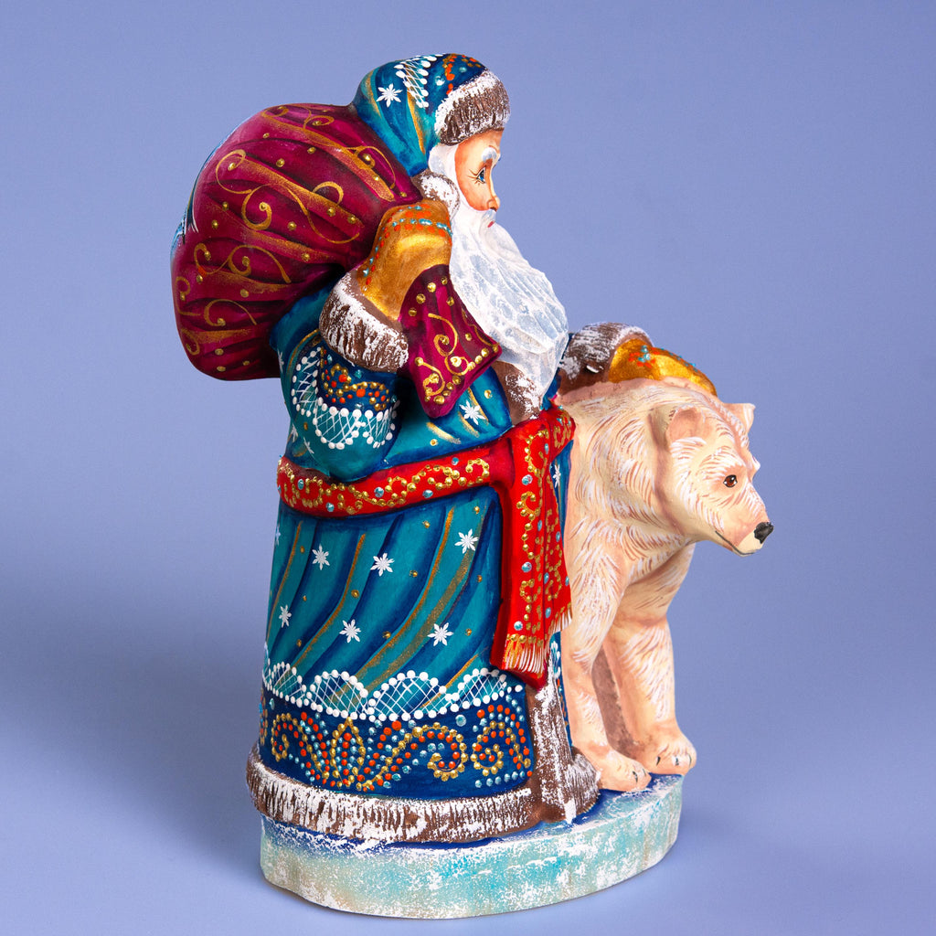 Blue Santa with Polar Bear Cub, 9" Hand Carved Wooden Figurine