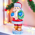 Santa Figurine 7", Hand‑Carved Wood, Christmas Wreath & Pipe