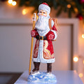 Hand carved wooden Santa figurine 11 inch, with backpack and staff, Christmas mantel decor
