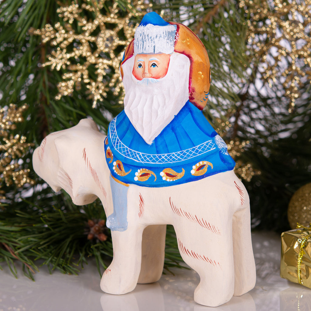 Old World Santa figurine riding polar bear, hand painted 6 inch