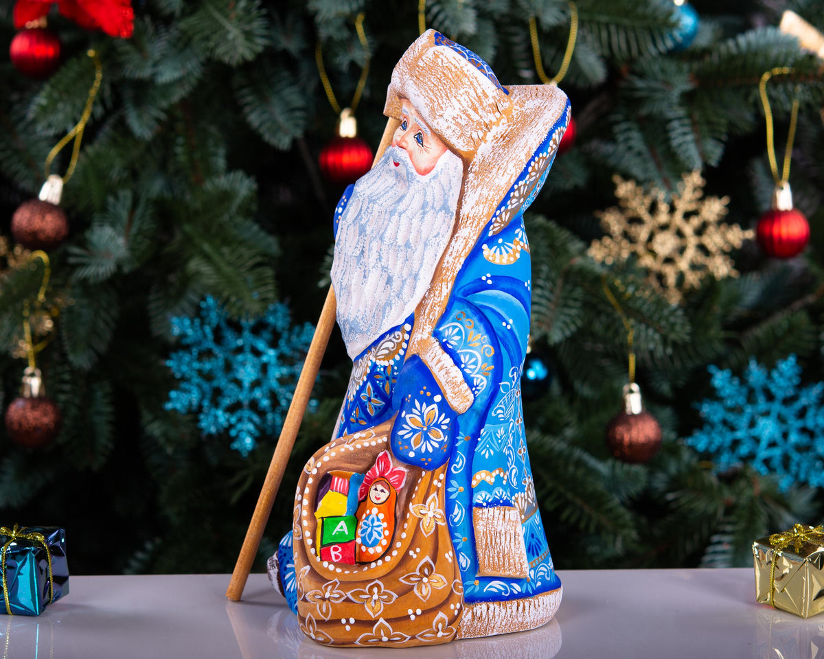 Hand carved blue Santa wooden figurine 9 inch, toy sack, mantel decor