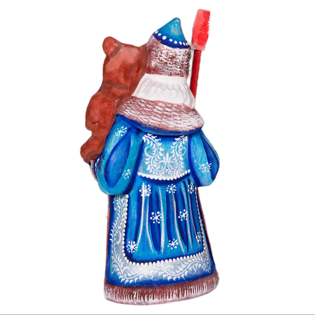Old World Santa figurine 8.5 inch, carved wood, blue coat, holding bear, mantel display