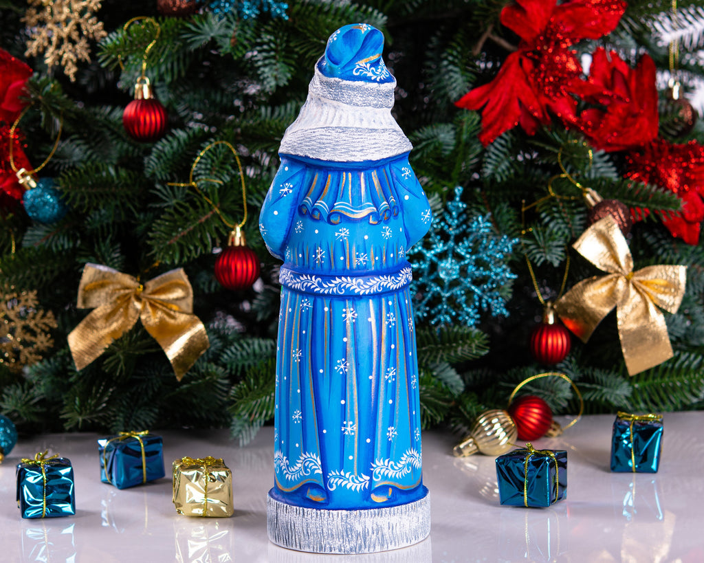 Blue Santa wood carving 11.5 inch, holding wreath, Christmas shelf or mantel decor