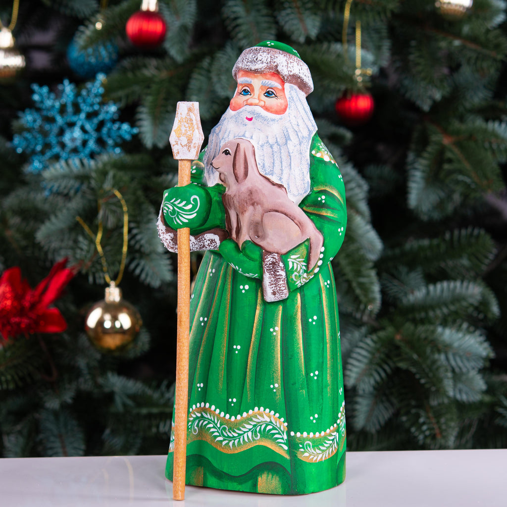 Hand carved Santa wooden figurine 8.7 inch, holding dog, green coat