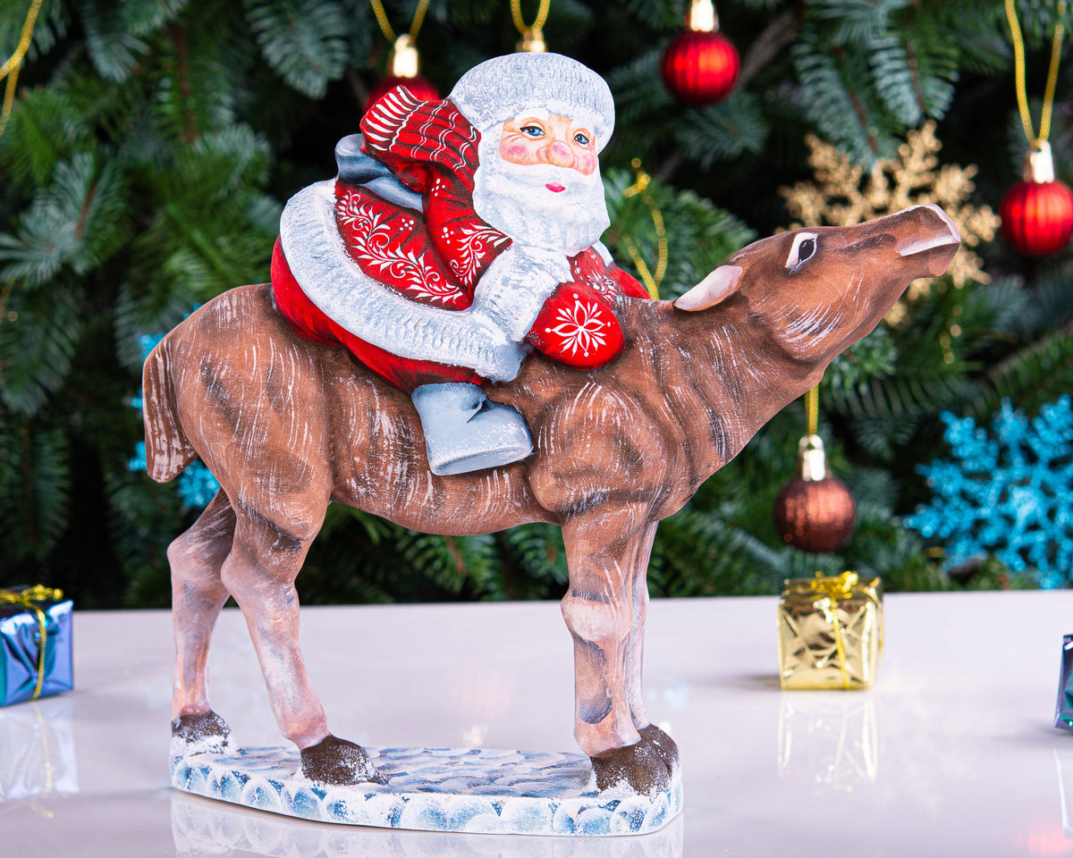 Hand carved wooden Santa riding reindeer figurine 8 inch, Nordic folk art centerpiece