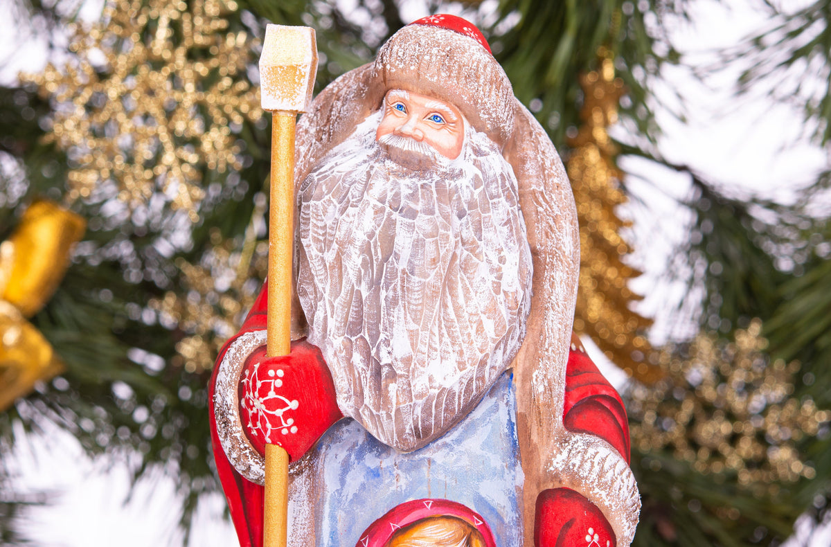 Father Christmas figurine, carved wood, folk art child scene, 9.4 inch