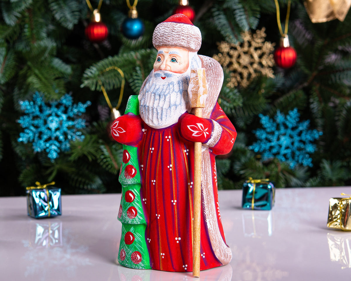 Hand carved wooden Santa figurine 8 inch, holding Christmas tree, holiday shelf decor