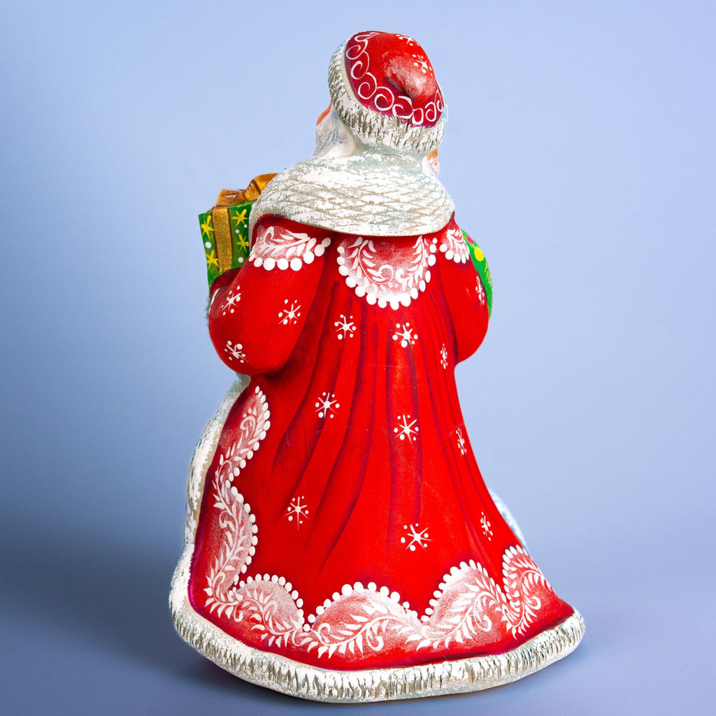Father Christmas wooden figurine 7 inch, gift in hand, tabletop centerpiece, folk art