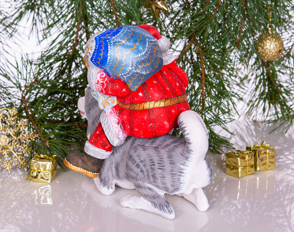 Hand-Carved Santa Claus Figurine on Dog: Retro Christmas Decor