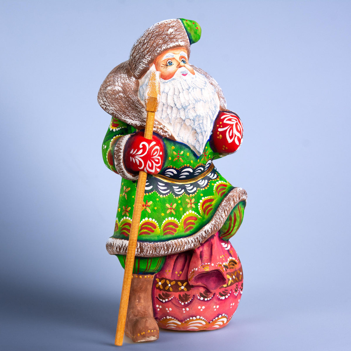 Santa Claus wood carving with staff, gift sack pedestal, 9.4 inch