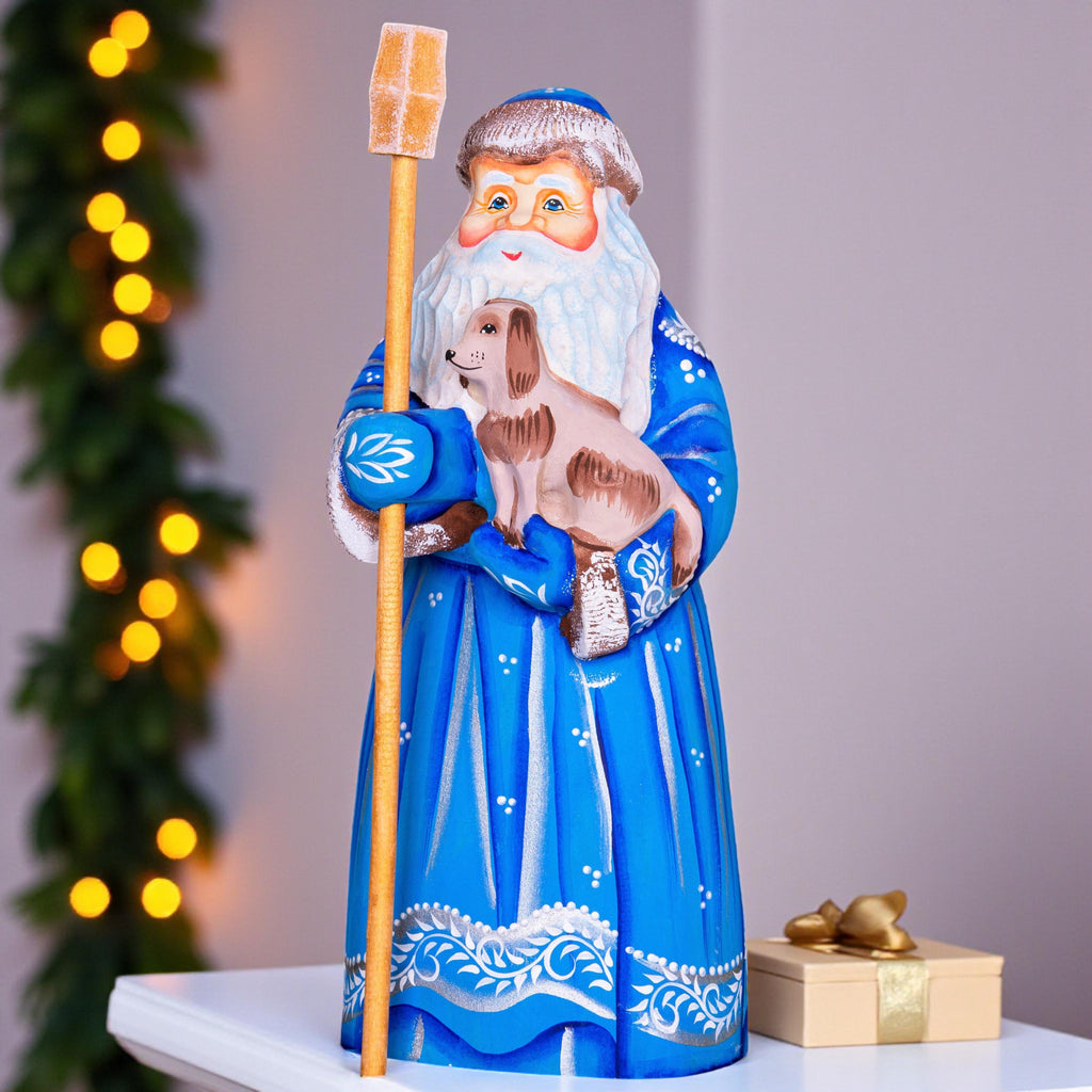Blue Santa wood figurine 8.7 inch, hand carved with dog, Christmas shelf accent